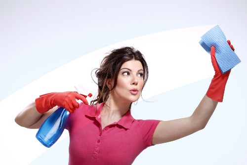 Local mattress cleaner working in a Brent bedroom
